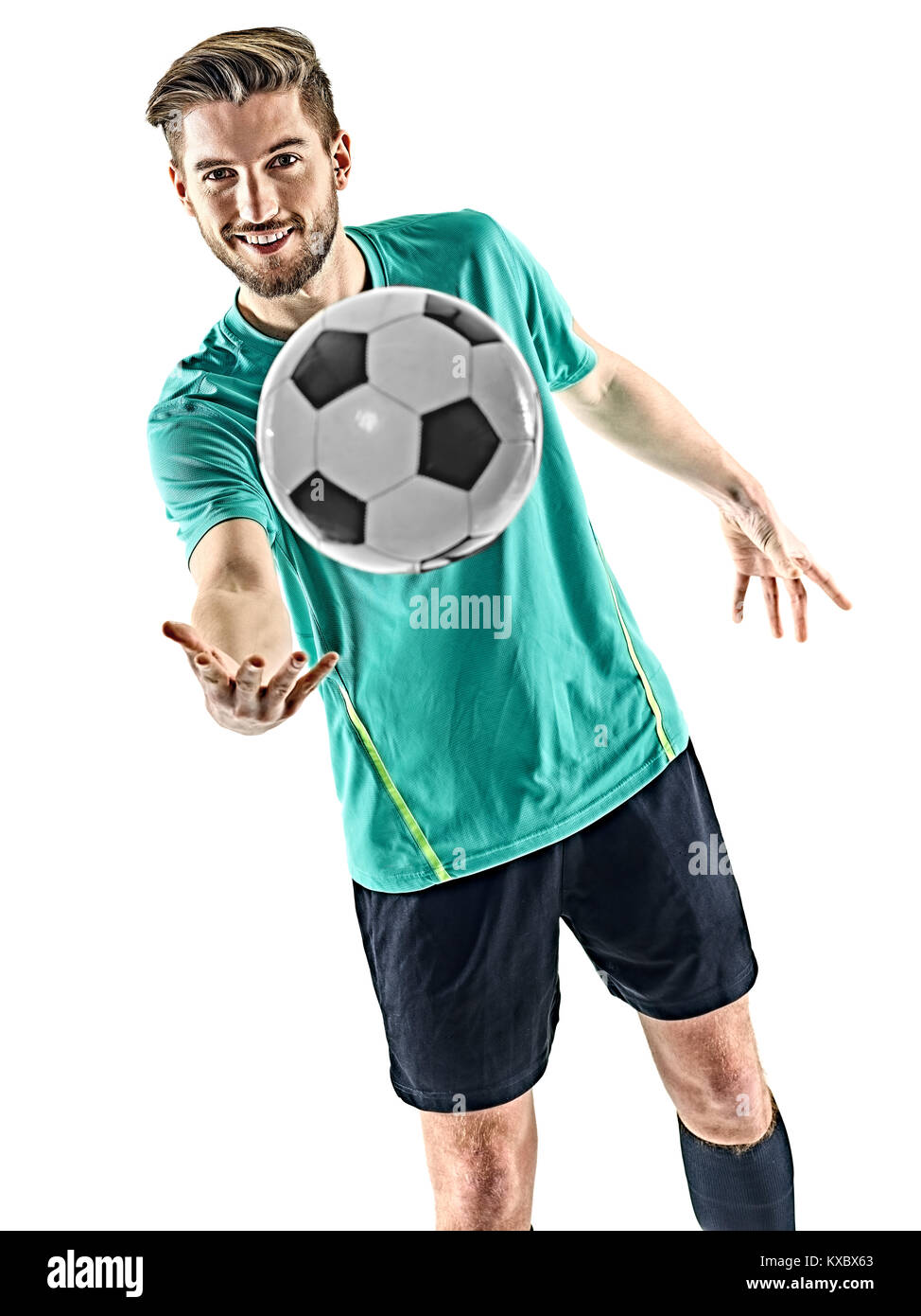 one caucasian soccer player man standing holding football isolated on