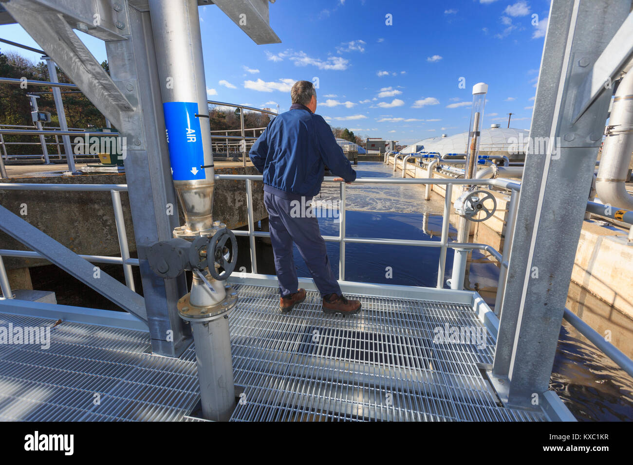 Engineer evaluating water treatment plant operation Stock Photo Alamy