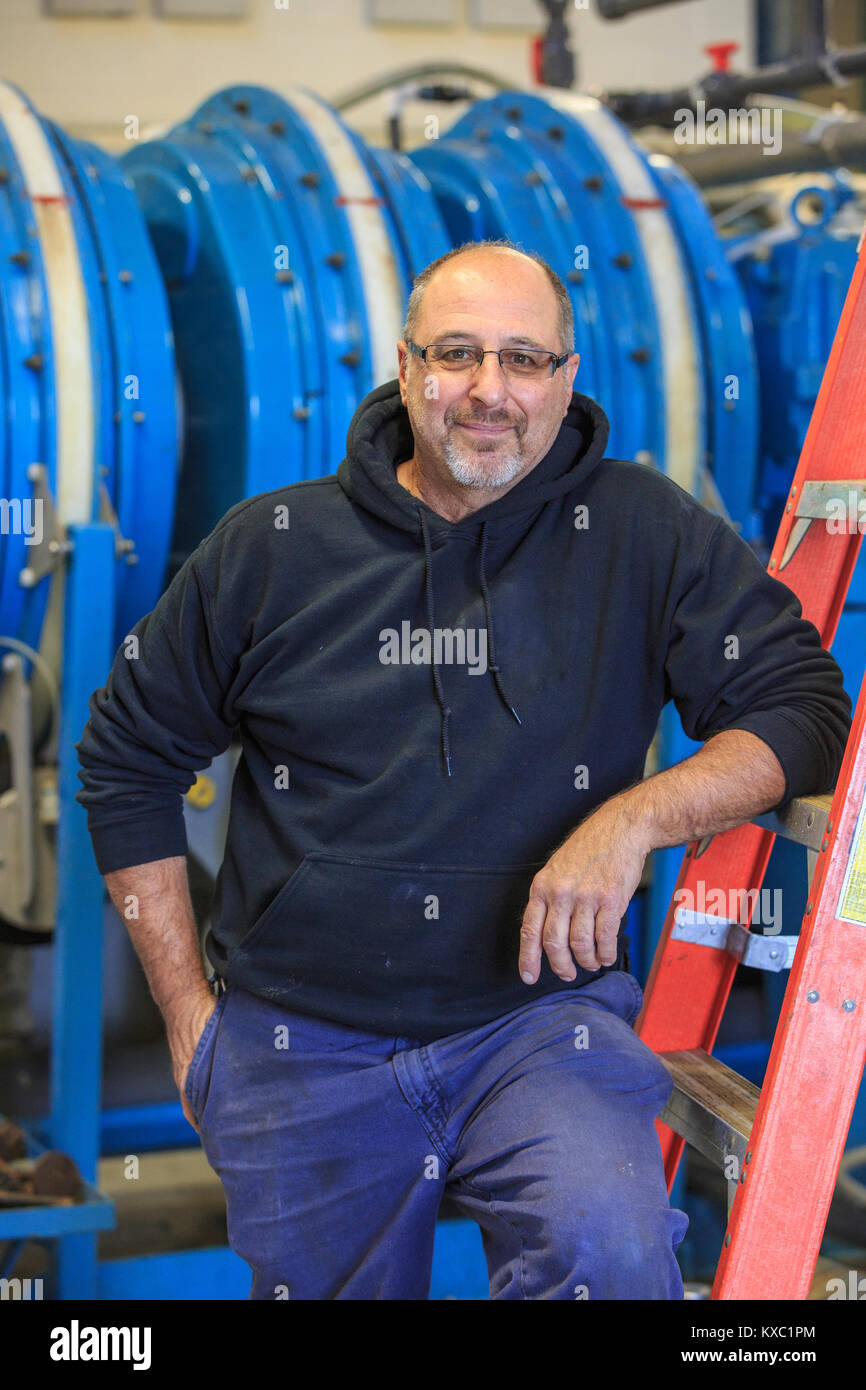Engineer in water treatment plant Stock Photo Alamy
