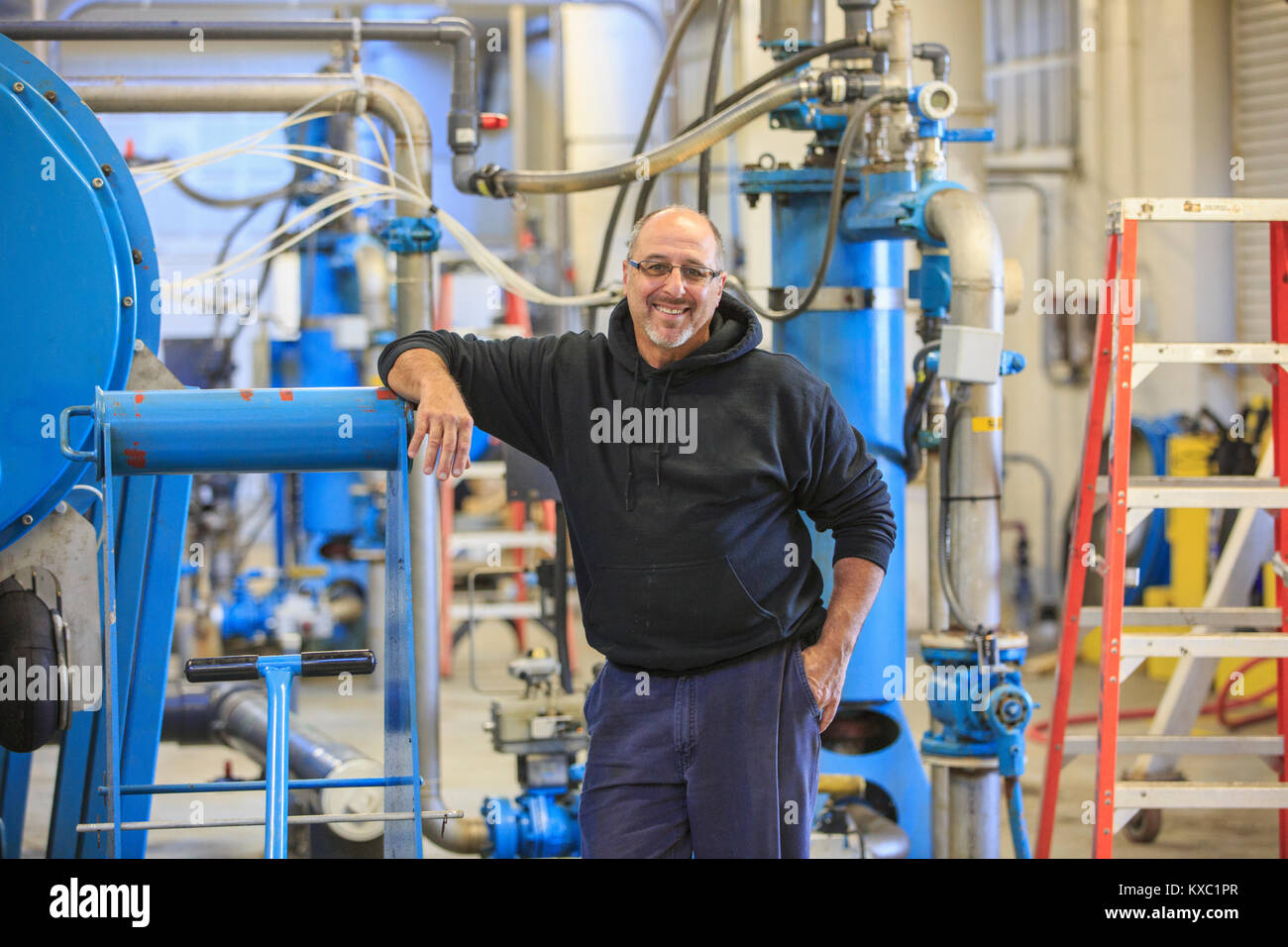 Engineer in water treatment plant Stock Photo Alamy