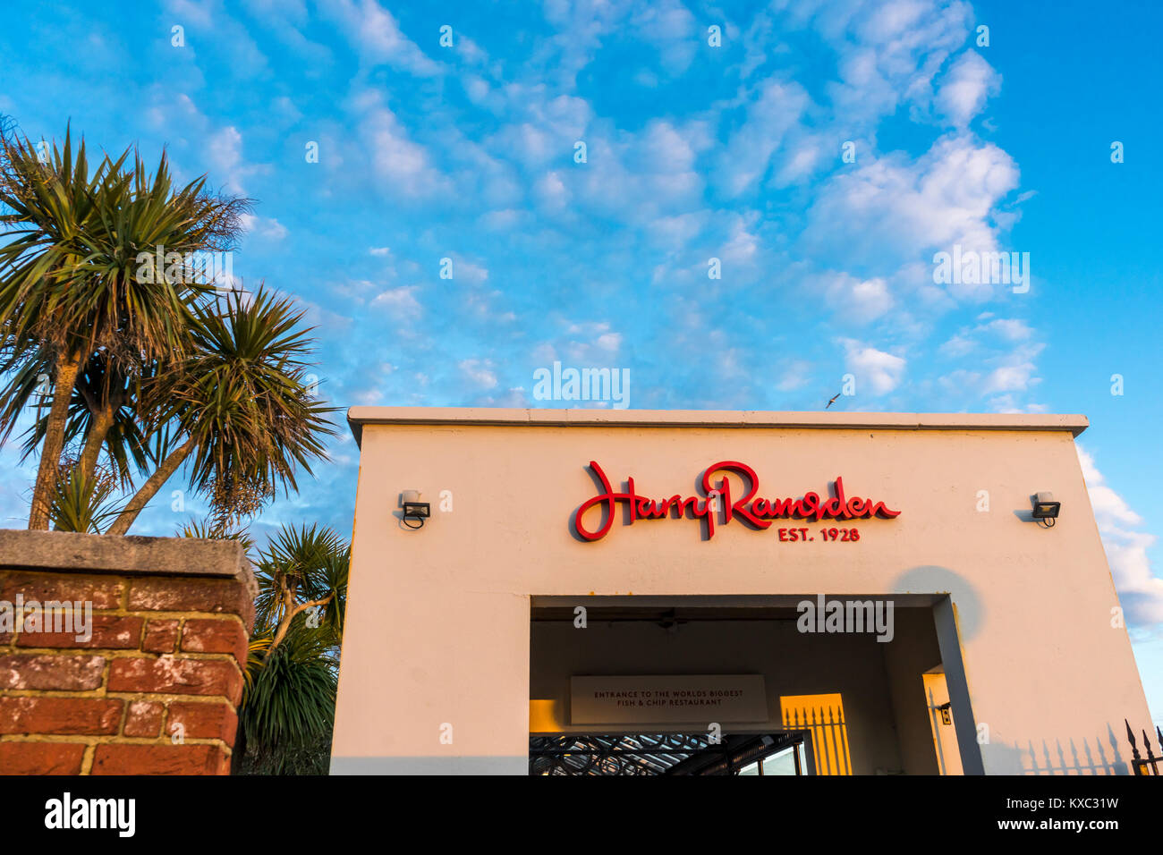 The Harry Ramsden Fish and Chips Restaurant at Bournemouth seafront during evening light against blue sky in January 2018, Dorset, England, UK Stock Photo