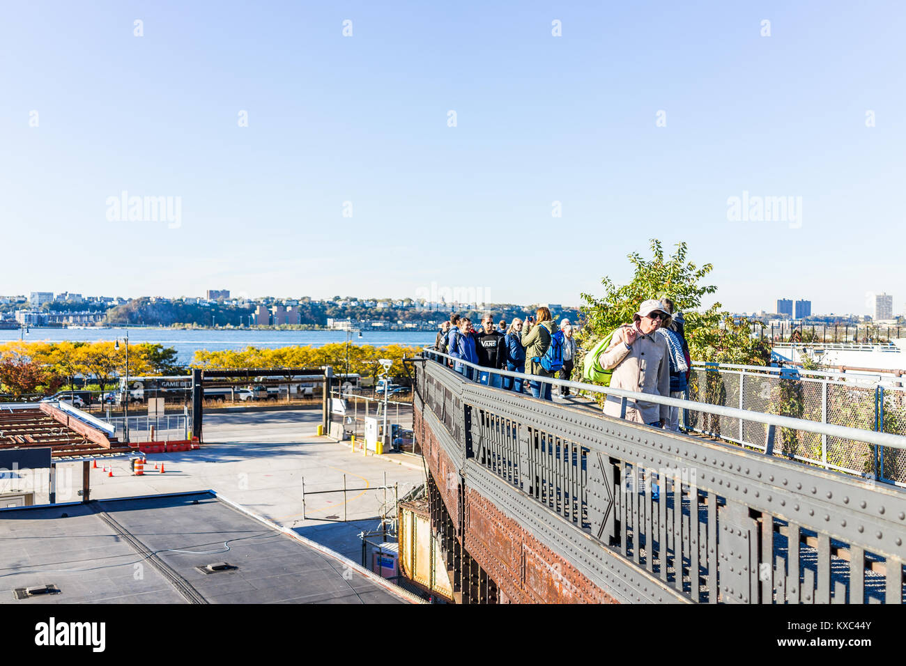 New York City, USA - October 27, 2017: View of Hudson River from highline, high line, urban in NYC with buses, people, in Chelsea West Side by Hudson  Stock Photo