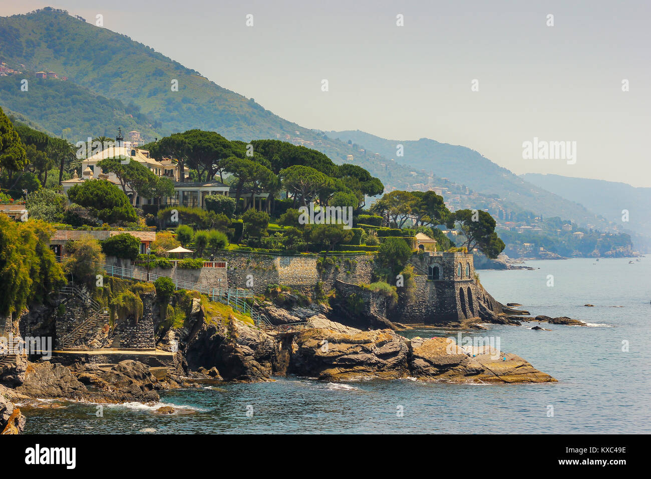 Seascape with the Mediterranean rocky coastline and promenade at Genoa Nervi, Liguria, Italy Stock Photo