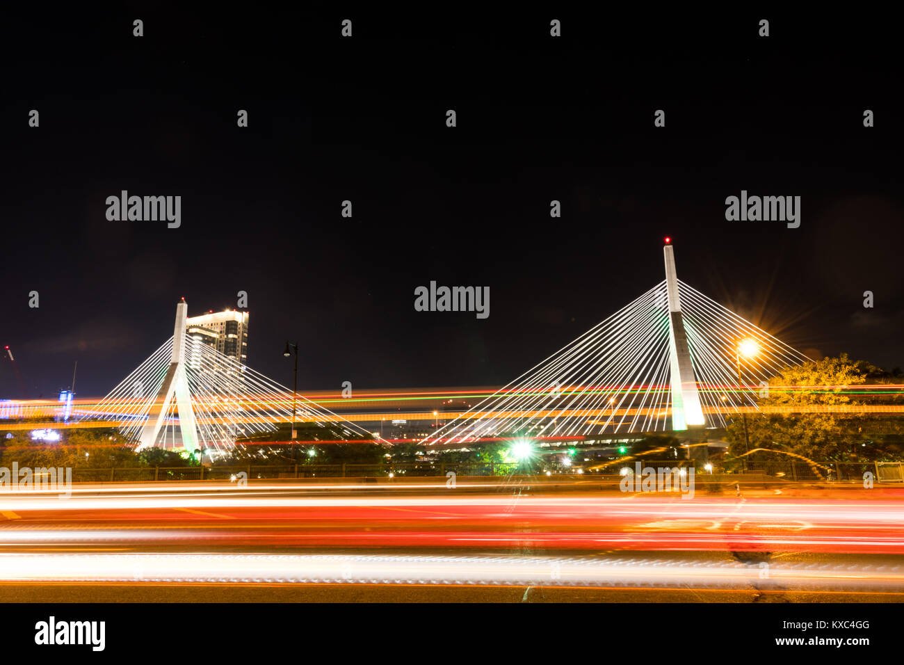 Traffic Passing Zakim Bridge at Night in Boston Stock Photo - Alamy