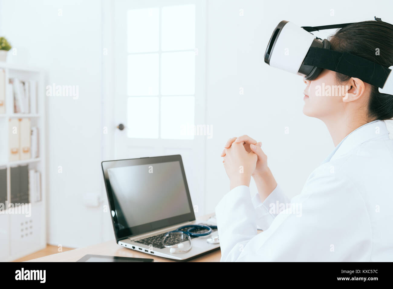 Doctor Wearing VR Glasses, Medical Mask and Gloves Hands in Front Isolated.  Indian Man Doctor Holding in Virtual Reality Stock Photo - Alamy