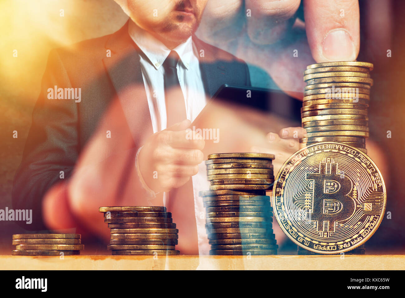 Businessman and Bitcoin cryptocurrency, blockchain technology and decentralized monetary system concept Stock Photo