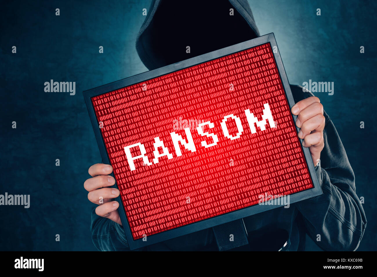 Ransomware computer virus concept, hacker with monitor screen. Internet and cyber security concept Stock Photo