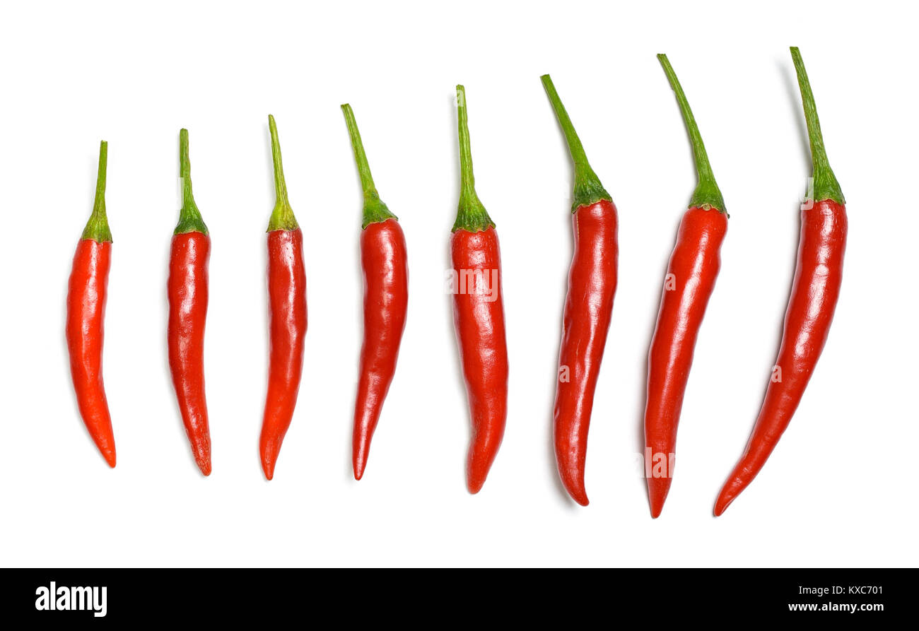 Red chili pepper on a white background - top view Stock Photo - Alamy