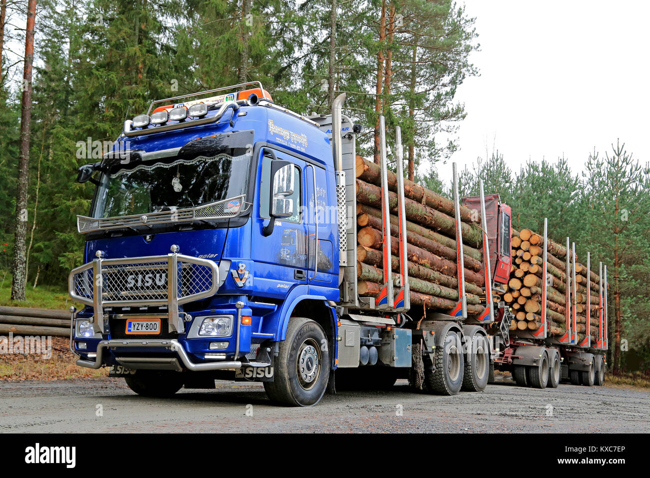 TENHOLA, FINLAND – NOVEMBER 9, 2014: Sisu Polar Timber truck with trailers  full of spruce logs. The Finnish Sisu Polar Euro 6 -series are equipped wit  Stock Photo - Alamy