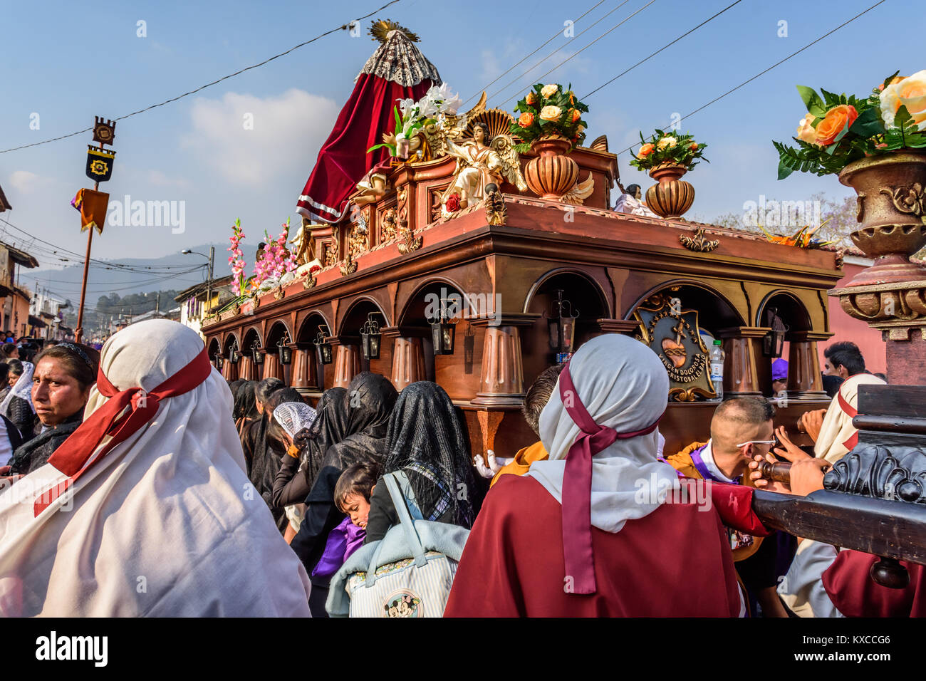 Antigua, Guatemala -  March 24, 2016: Locals participate in Holy Thursday procession in town with famous Holy Week celebrations Stock Photo