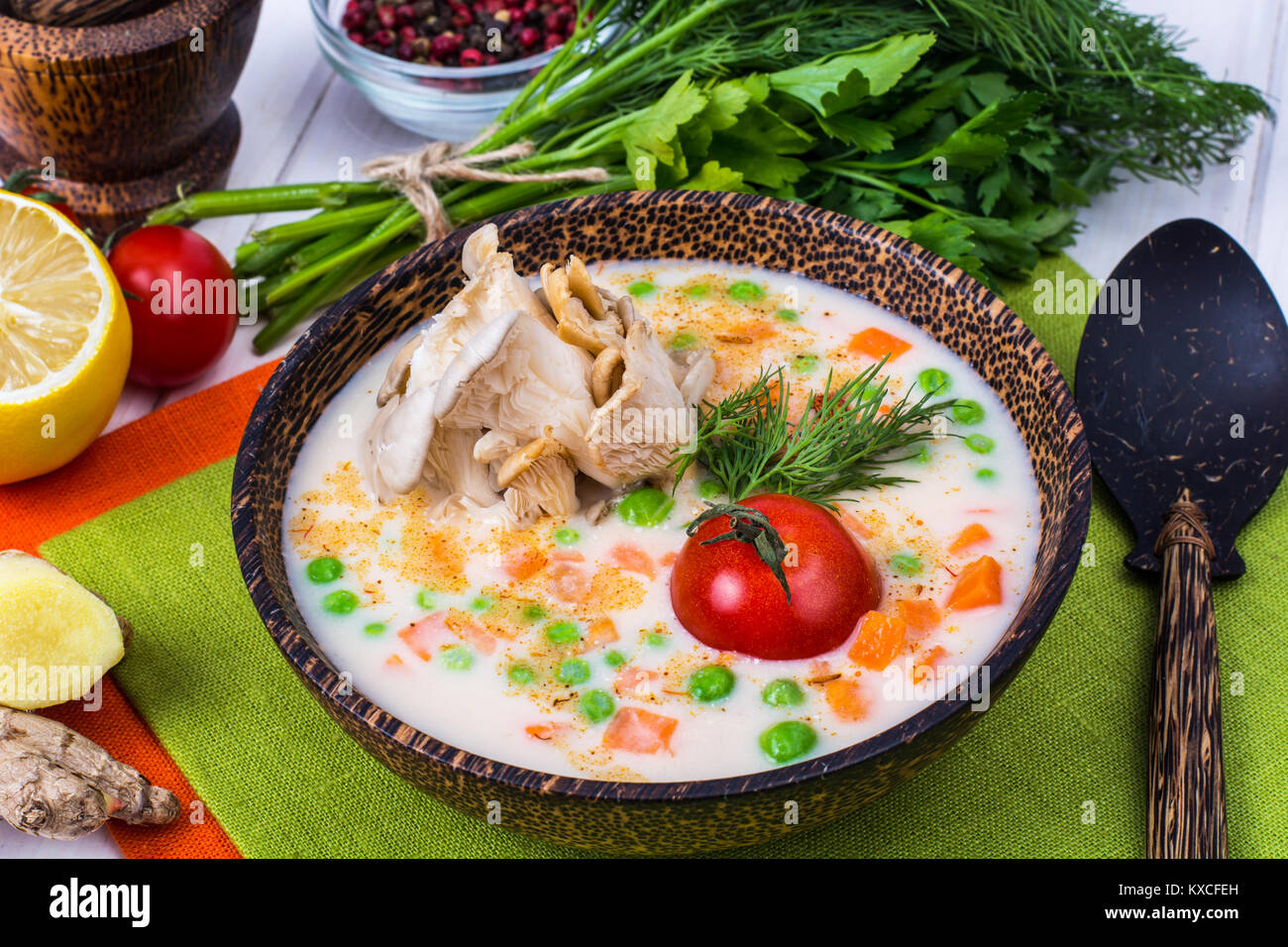 Vegetable soup cream with cream, carrots, peas and mushrooms Stock