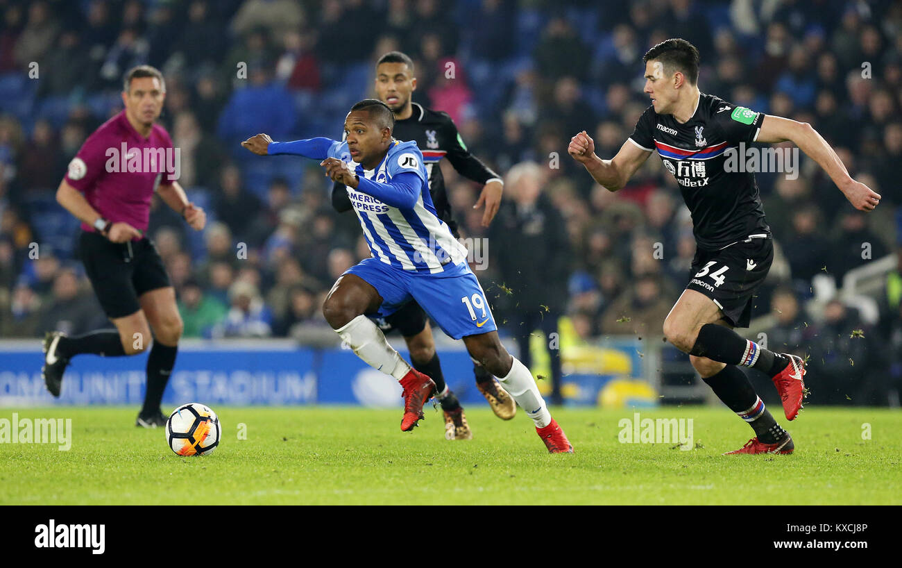 Brighton & Hove Albion's Jose Izquierdo breaks through Crystal Palace's Martin Kelly (right) and Jairo Riedewald during the Emirates FA Cup, Third Round match at the AMEX Stadium, Brighton. Stock Photo