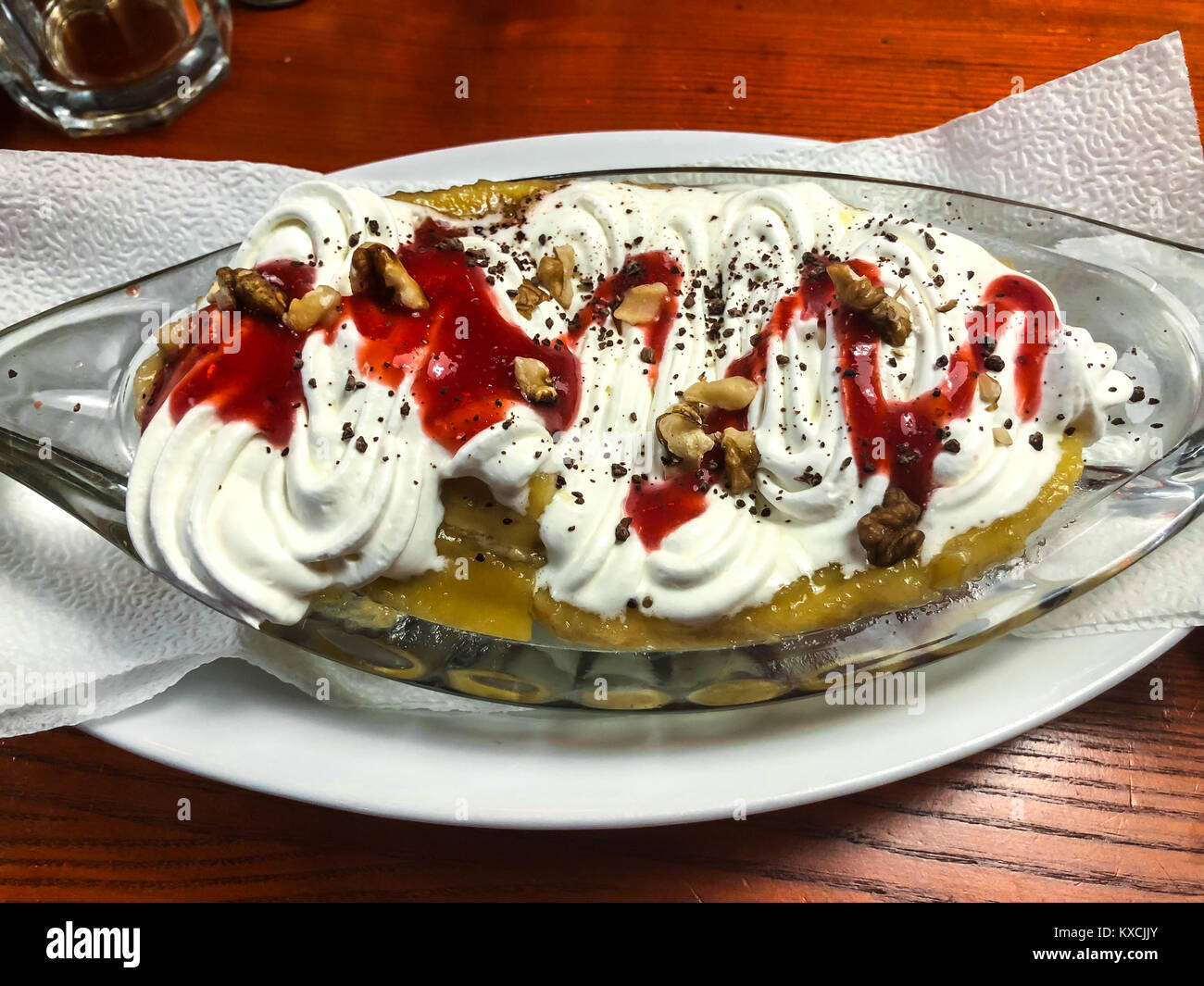 Banana dessert with whipped cream Stock Photo Alamy