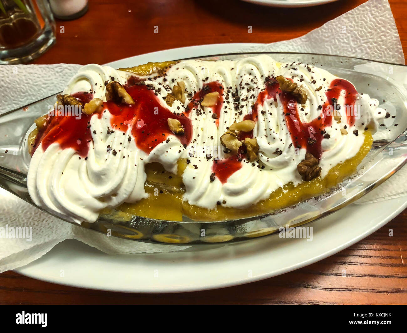 Banana dessert with whipped cream Stock Photo Alamy