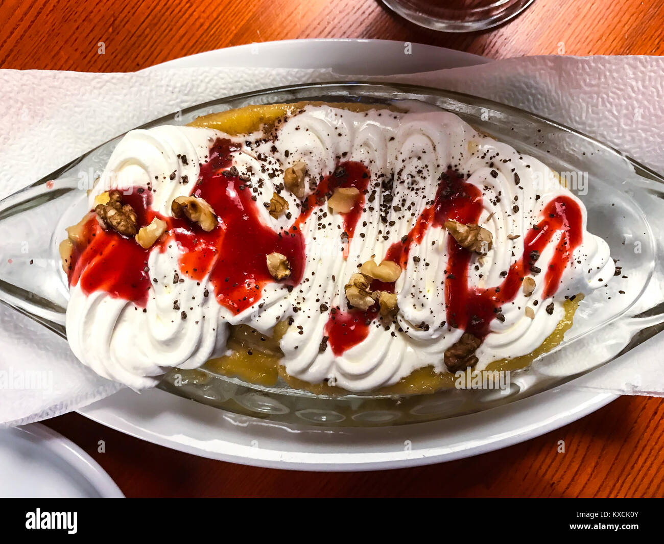 Banana dessert with whipped cream Stock Photo Alamy