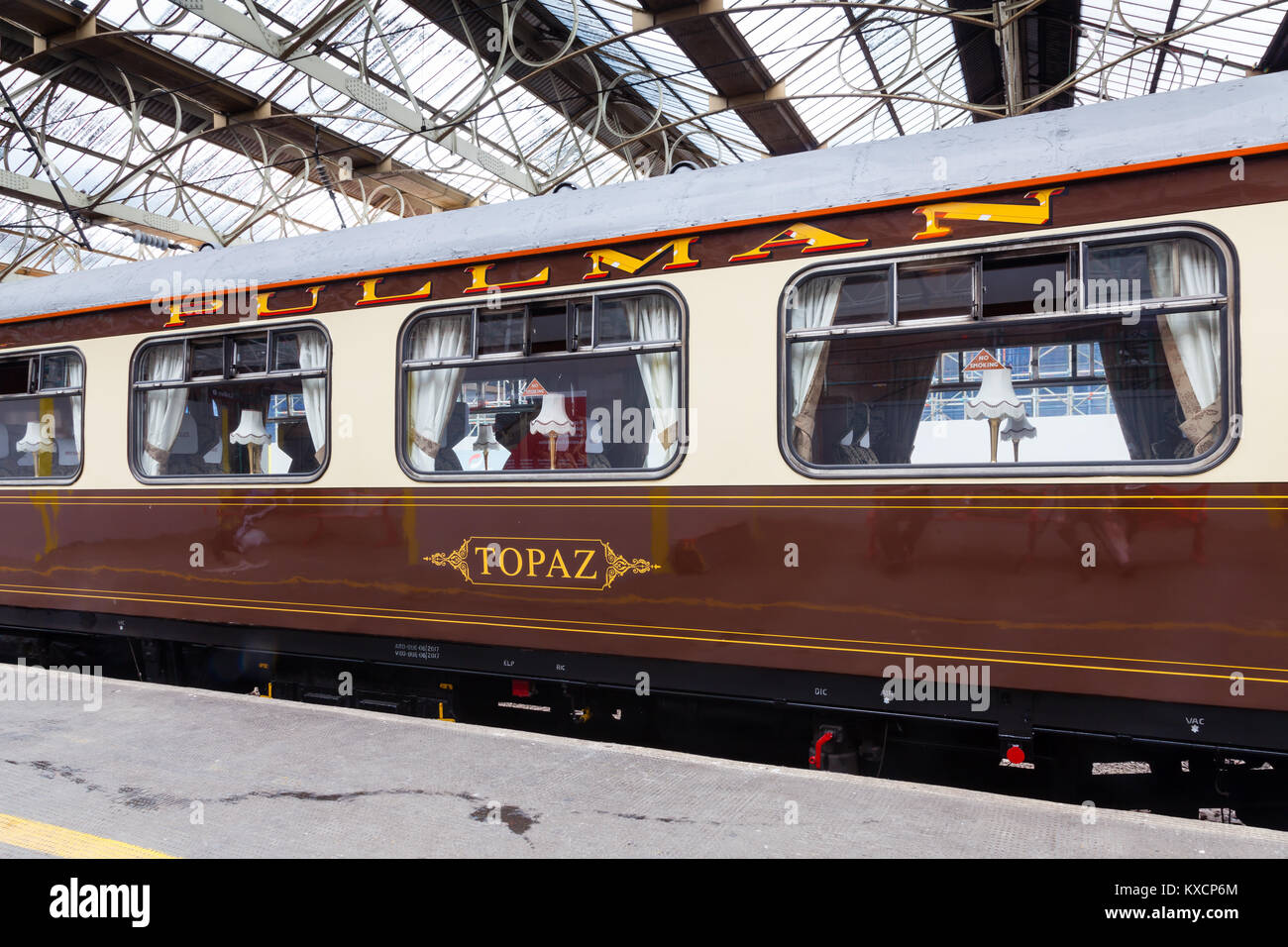 A preserved Pullman carriage is pictured in Carlisle Citadel station in Cumbria.  Pullman was a luxury railway service that operated in Great Britain. Stock Photo