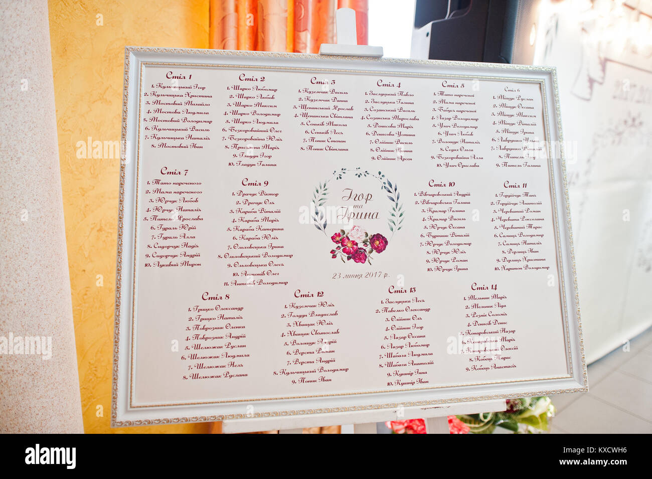 White wedding seating chart with the names of invited guests. Stock Photo