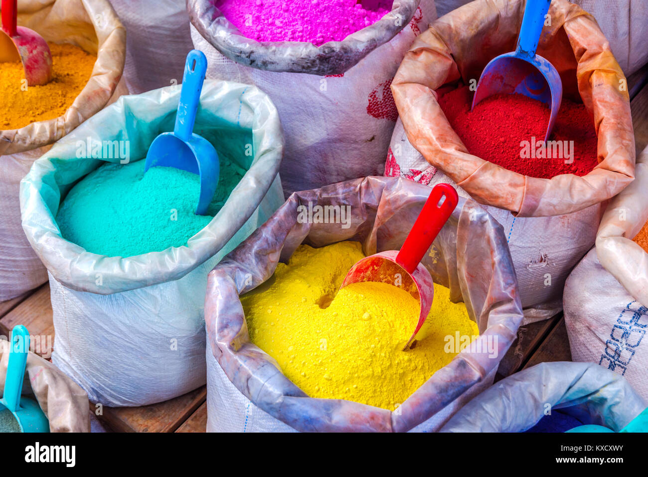Colorful dry dyes and pigments powders in bags Stock Photo Alamy