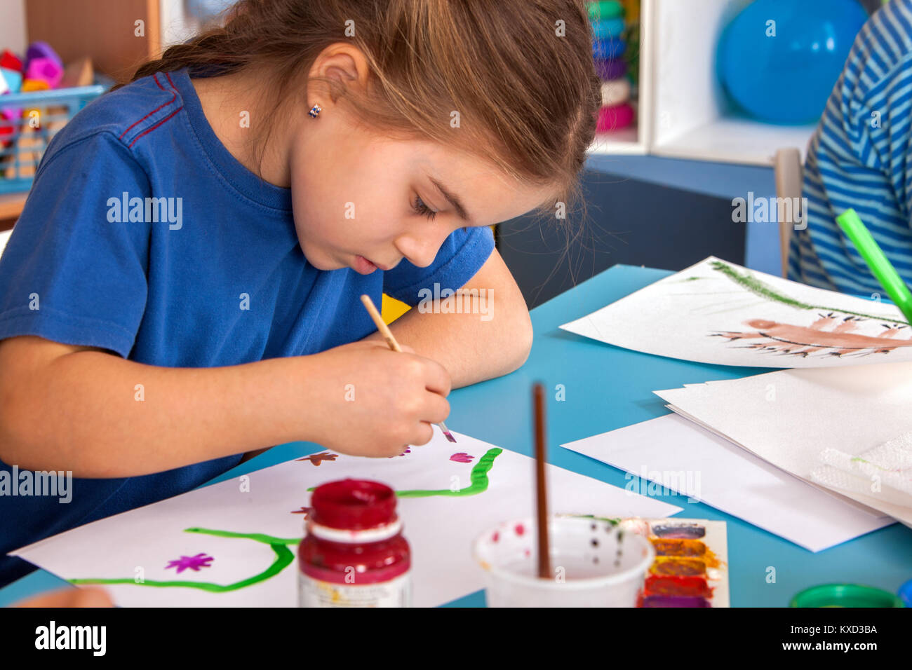 Small students children painting in art school class Stock Photo - Alamy