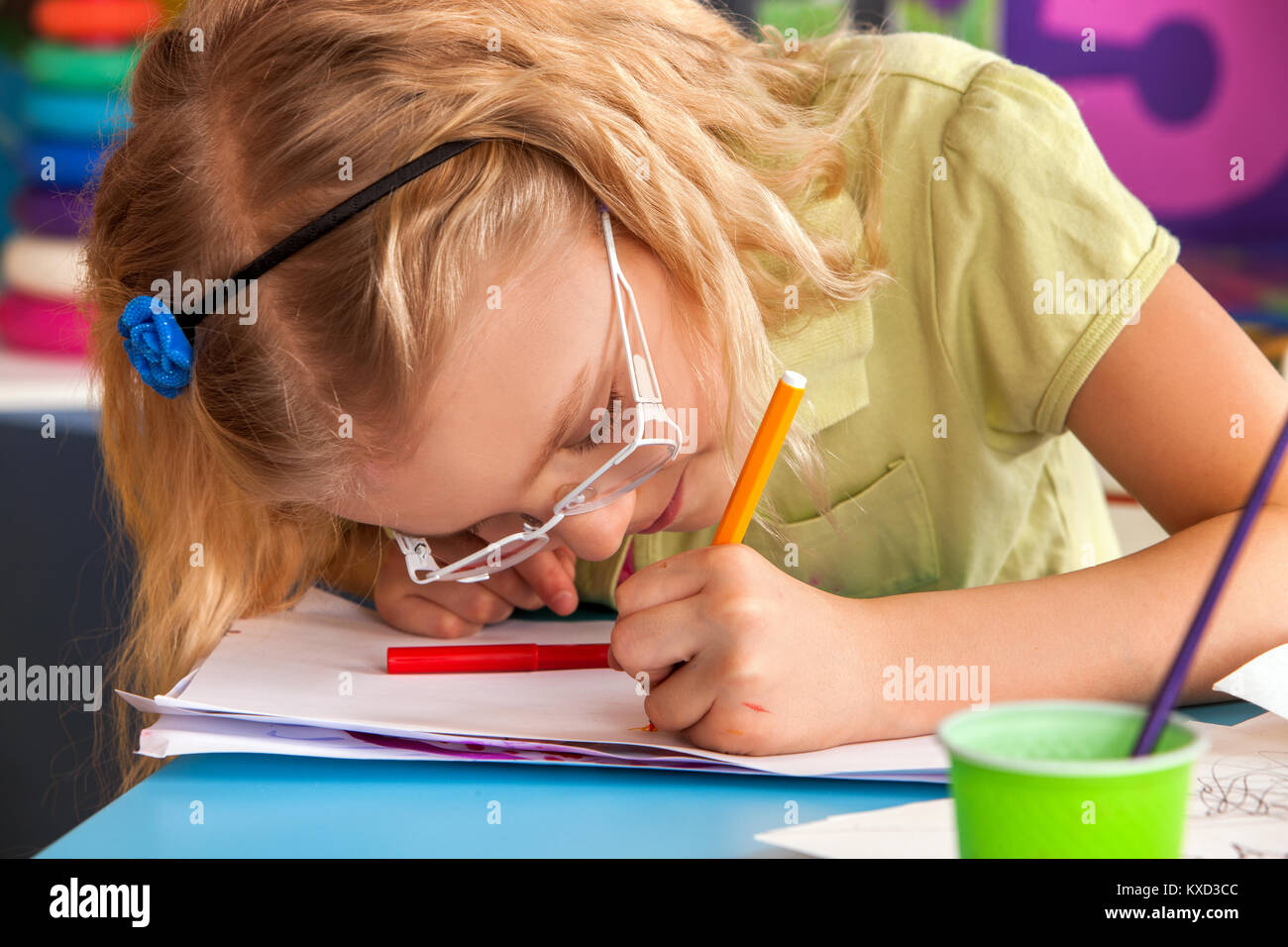 Small students children painting in art school class. Stock Photo