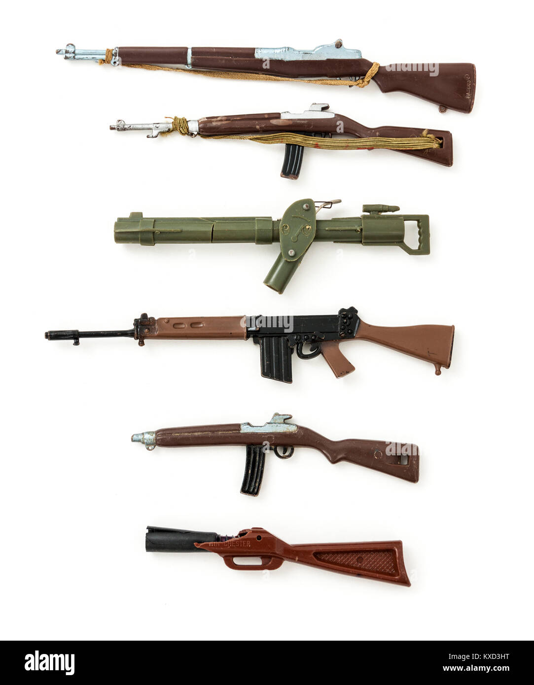 Selection of vintage Action Man accessories from the 1960s made by Palitoy in England, including several machine guns and a bazooka. Stock Photo