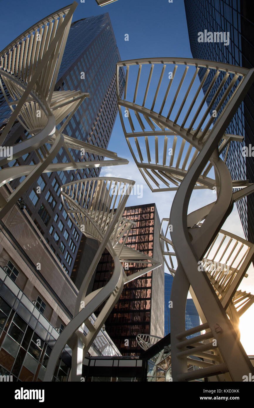 Low angle view of metal structure against modern buildings in city Stock Photo