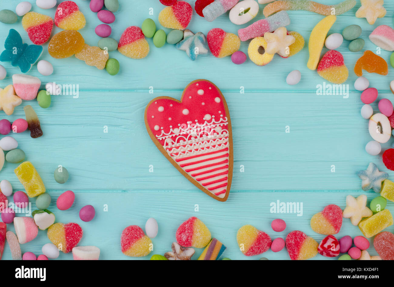 Frame with sweets, wooden background. Stock Photo