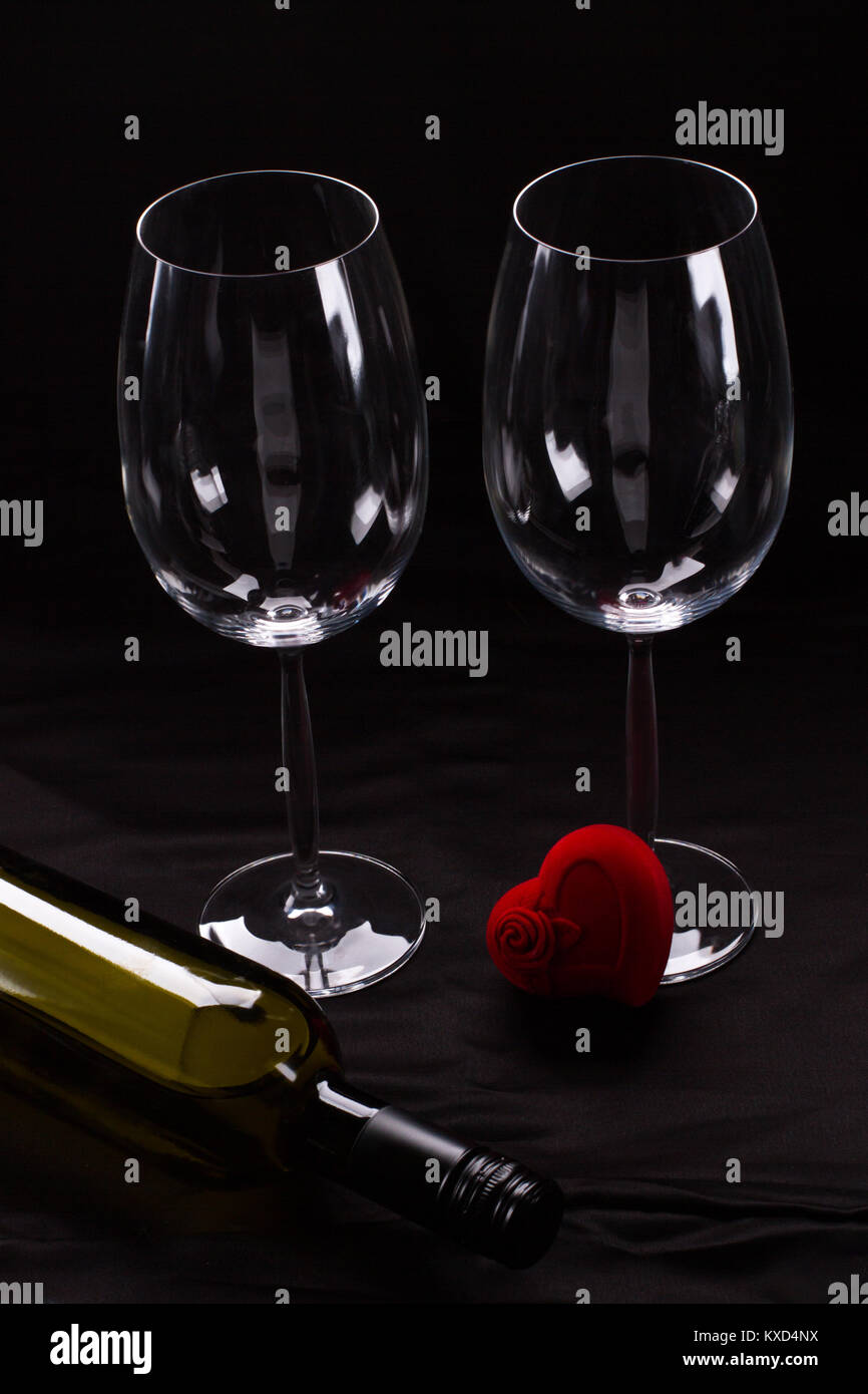 Two wine glasses, bottle and gift box Stock Photo Alamy