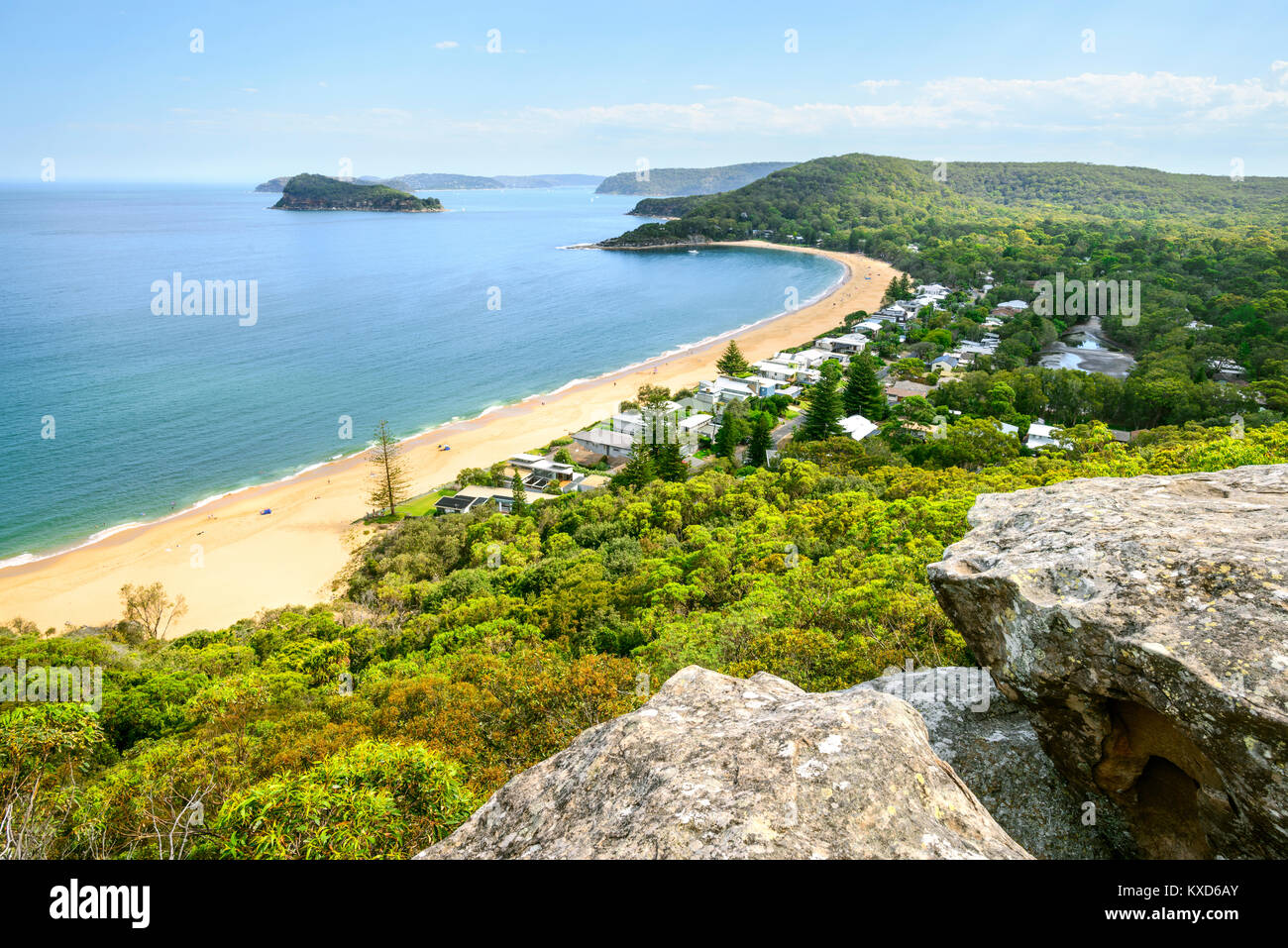 Pearl Beach on a sunny day with blue sky from Mount Ettalong Lookout, Central Coast, NSW, Australia Stock Photo