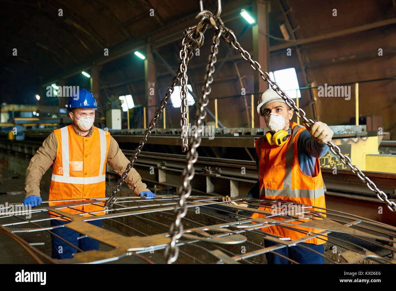 Steel Plant Workers Using Lifting Beam Stock Photo Alamy