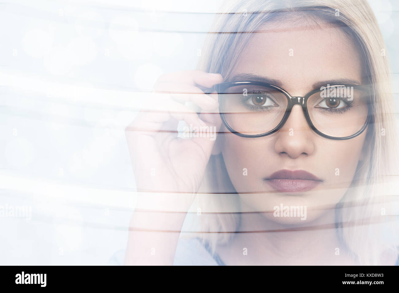 Young attractive woman wearing glasses Stock Photo by ©AVFC 90806098