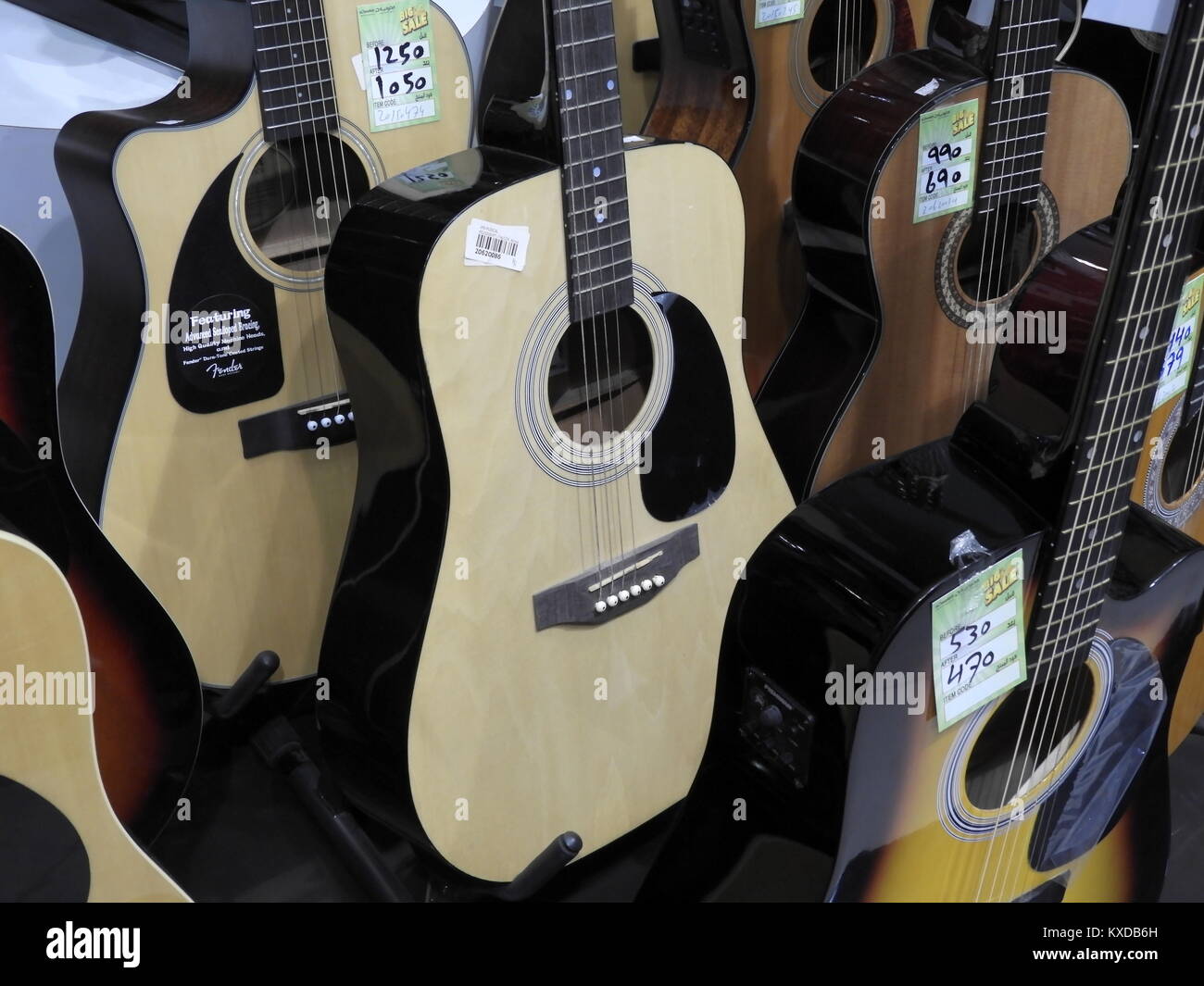 Colourful Guitars for sale in a Guitar and musical instruments shop