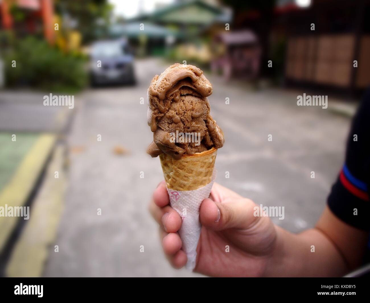Photo of a chocolate ice cream on a cone Stock Photo