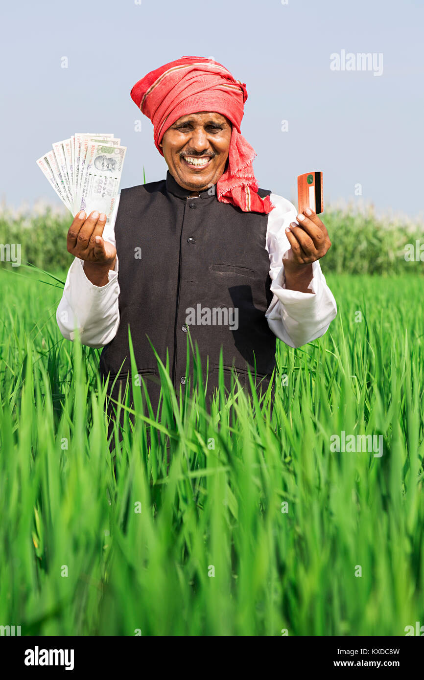 1 Indian Rural Farmer Showing Debit Card And Rupees Field Stock Photo ...