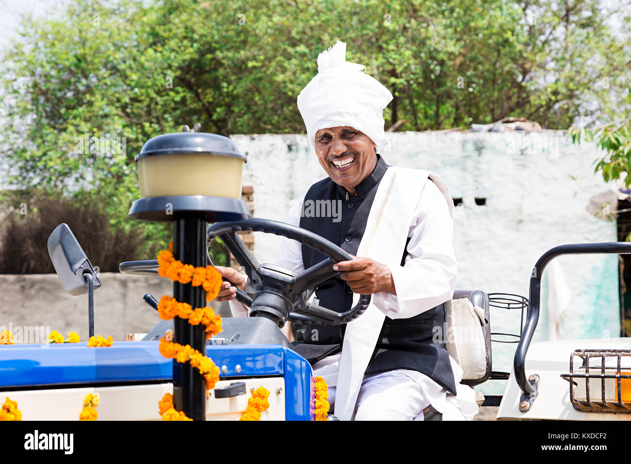 Smiling 1 Indian Rural Farmer Man Riding Tractor Driving Village Stock Photo Alamy