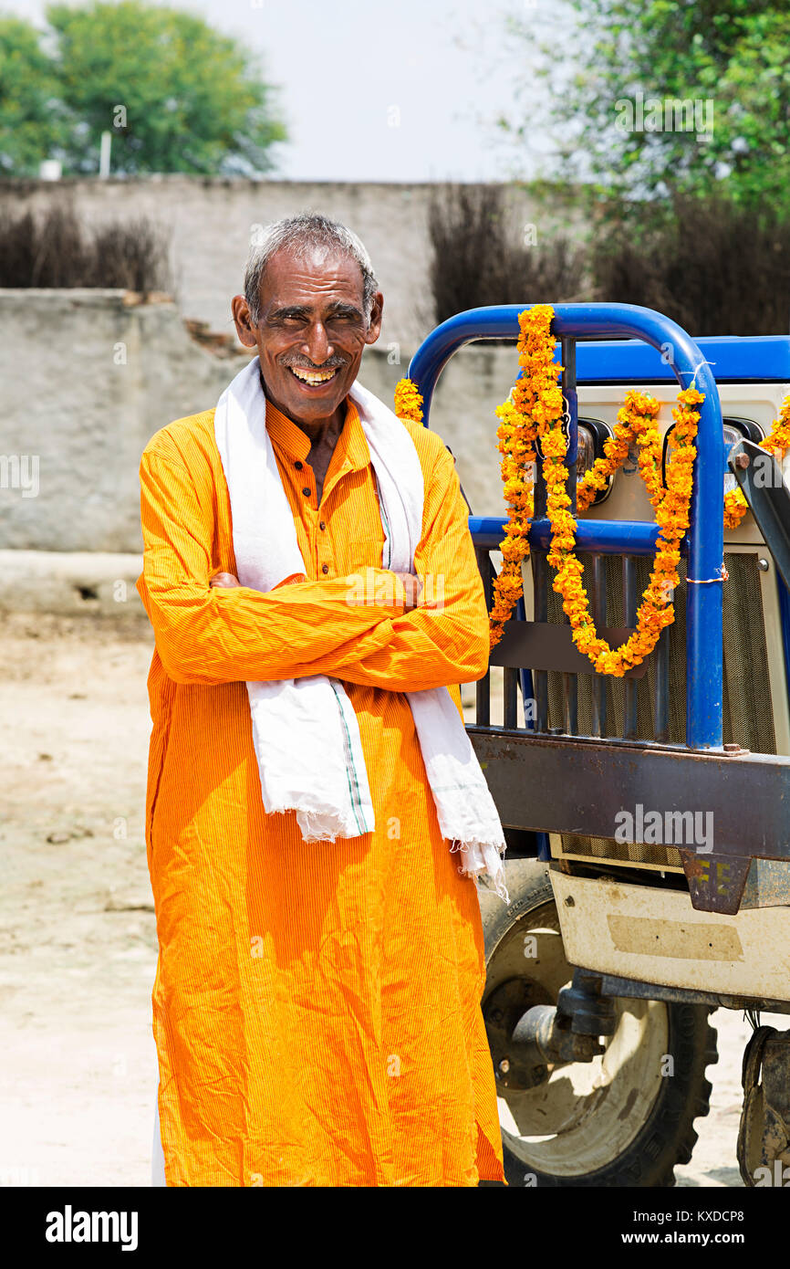 1 Indian Rural Farmer Old Man Standing Near New Tractor Stock Photo - Alamy