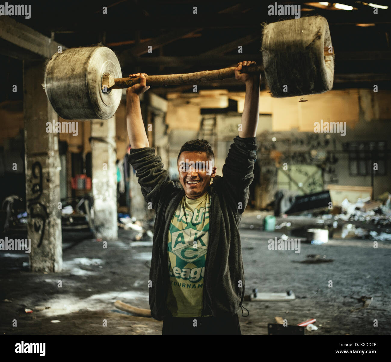 Refugees,Afghani,Pakistani youth,abandoned department store,Belgrade,Serbia Stock Photo