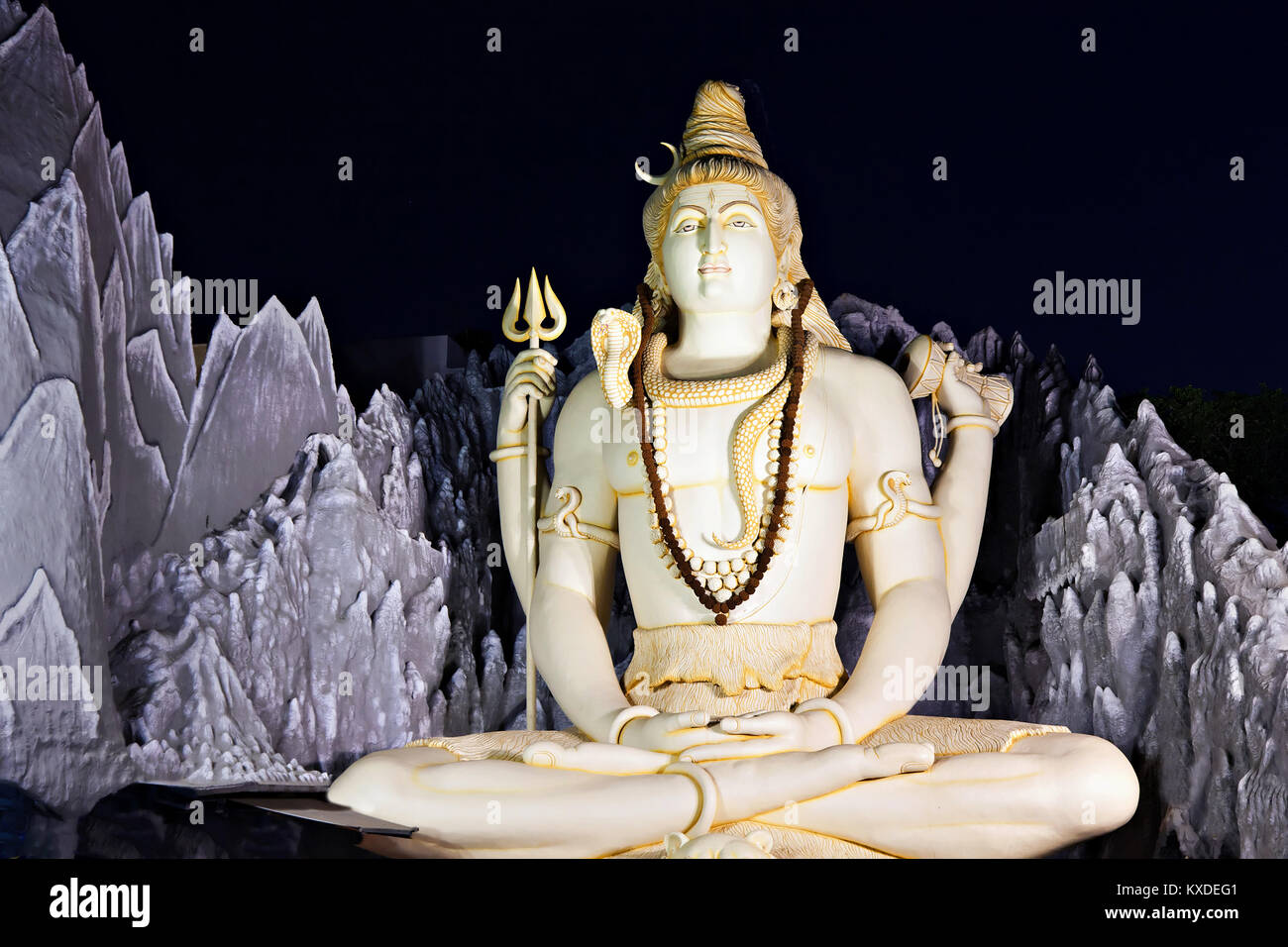 BANGALORE, INDIA - MARCH 27: Big Lord Shiva statue sitting in lotus with trident on March 27, 2012 in Bangalore, India. This Shiva Statue is highest i Stock Photo