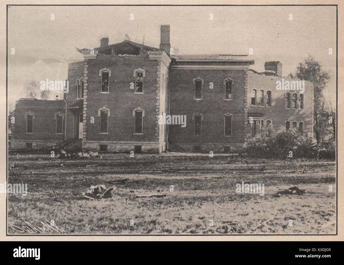 The Wrecked Schoolhouse, showing the Damage done to the upper Portion Stock Photo