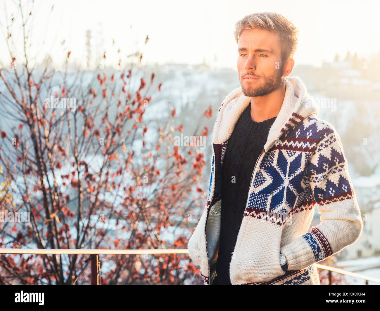 Handsome young man outdoor in winter fashion Stock Photo - Alamy
