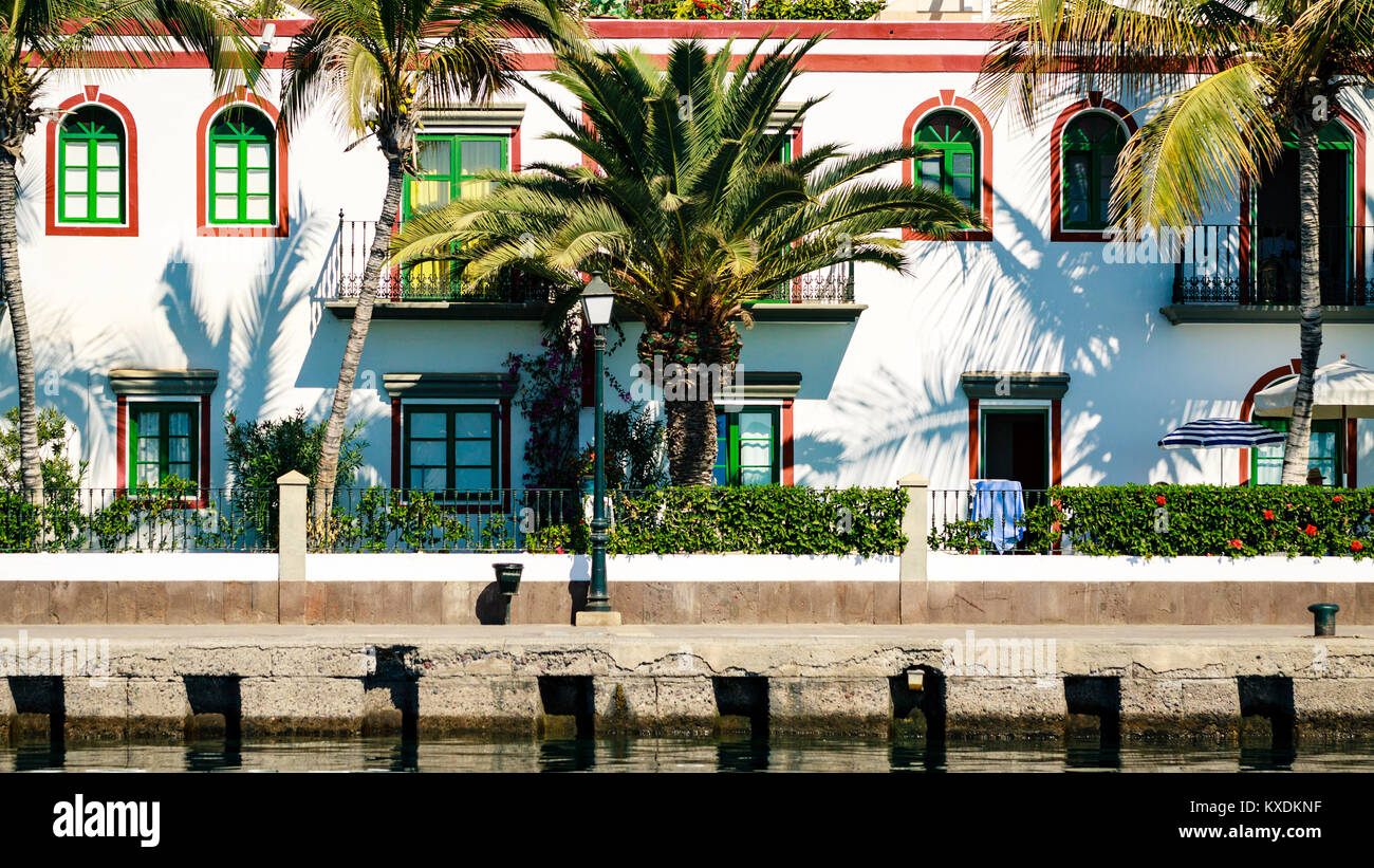 Colourful port with palm trees Puerto De Mogan on Gran Canaria island. Stock Photo