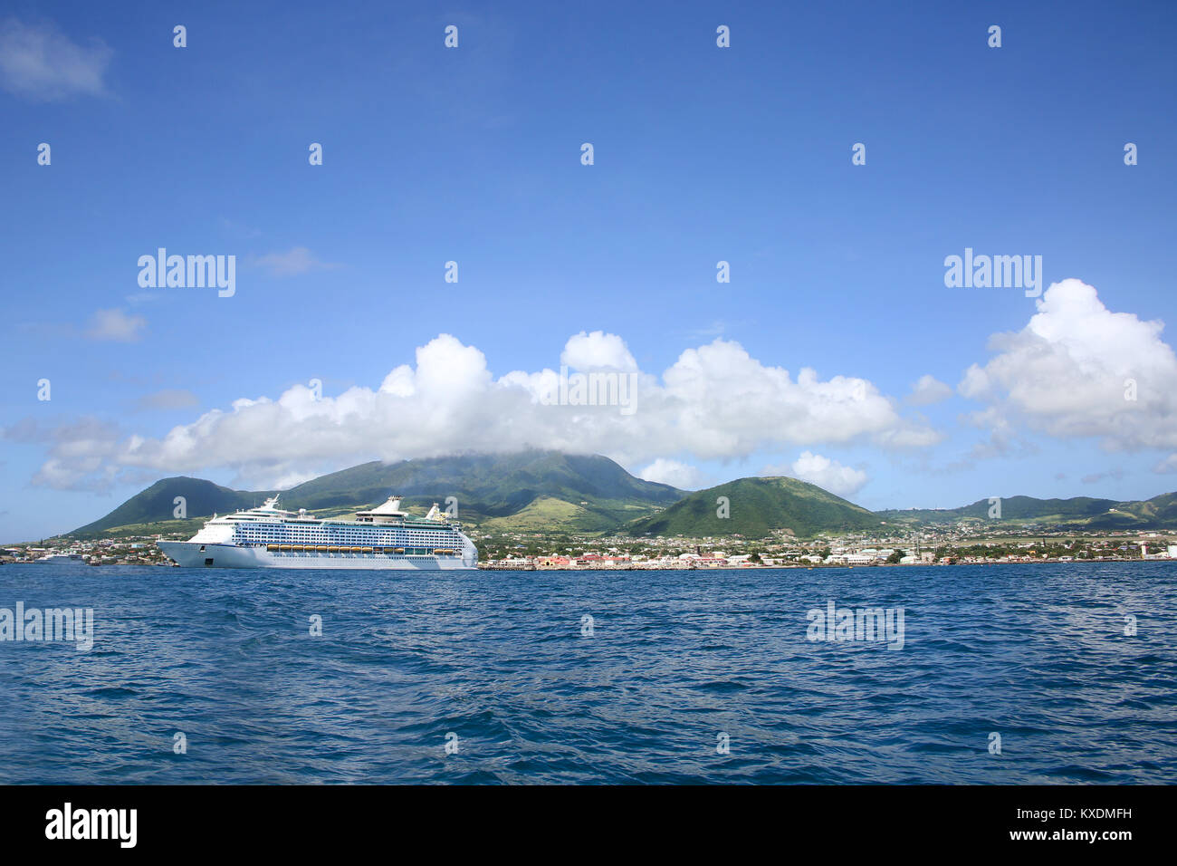 The island of St Kitts, with beautiful landscape & a Cruise ship anchored off the shore, Basseterre, St Kitts, Caribbean. Stock Photo
