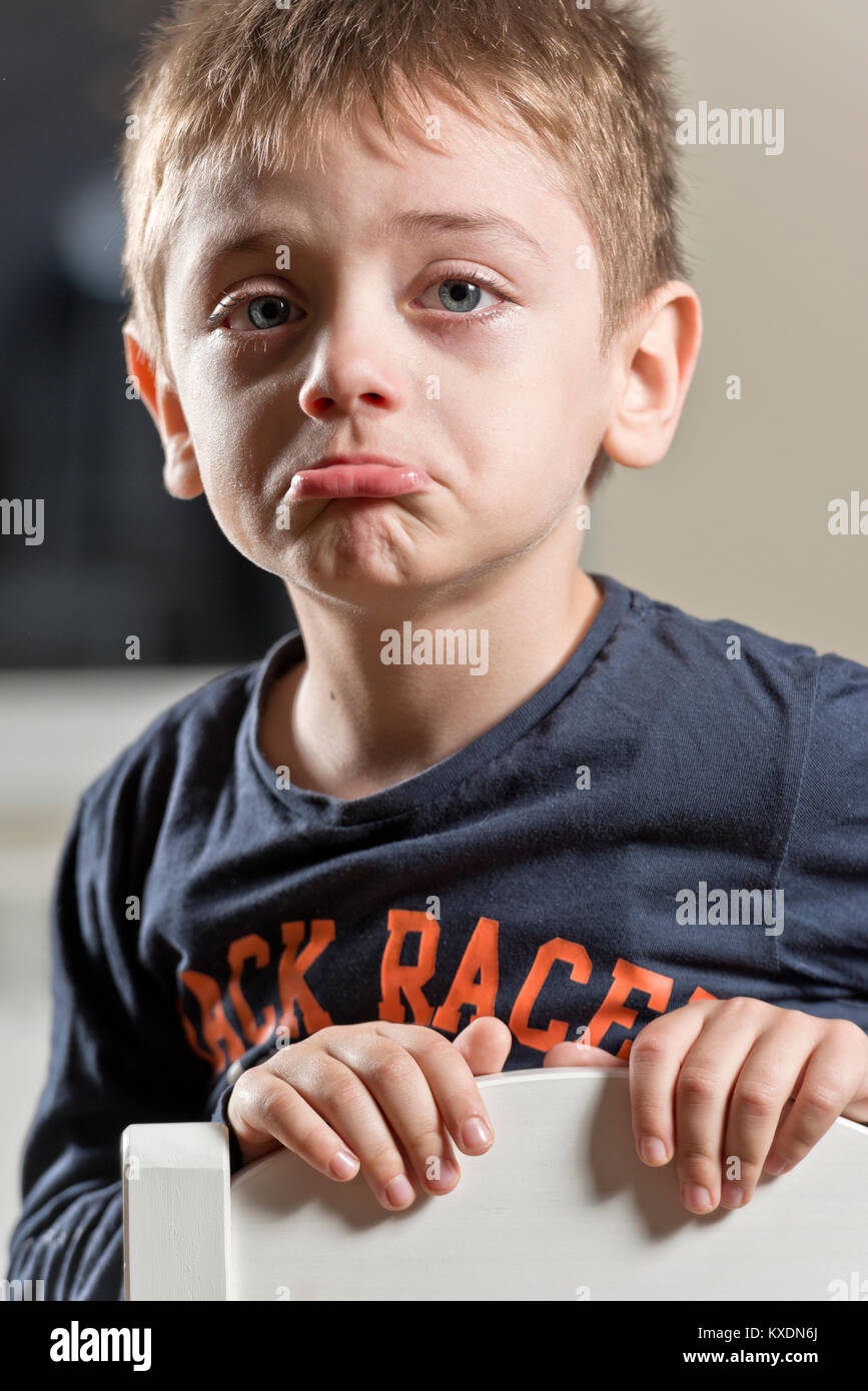 Child Sitting On Chair