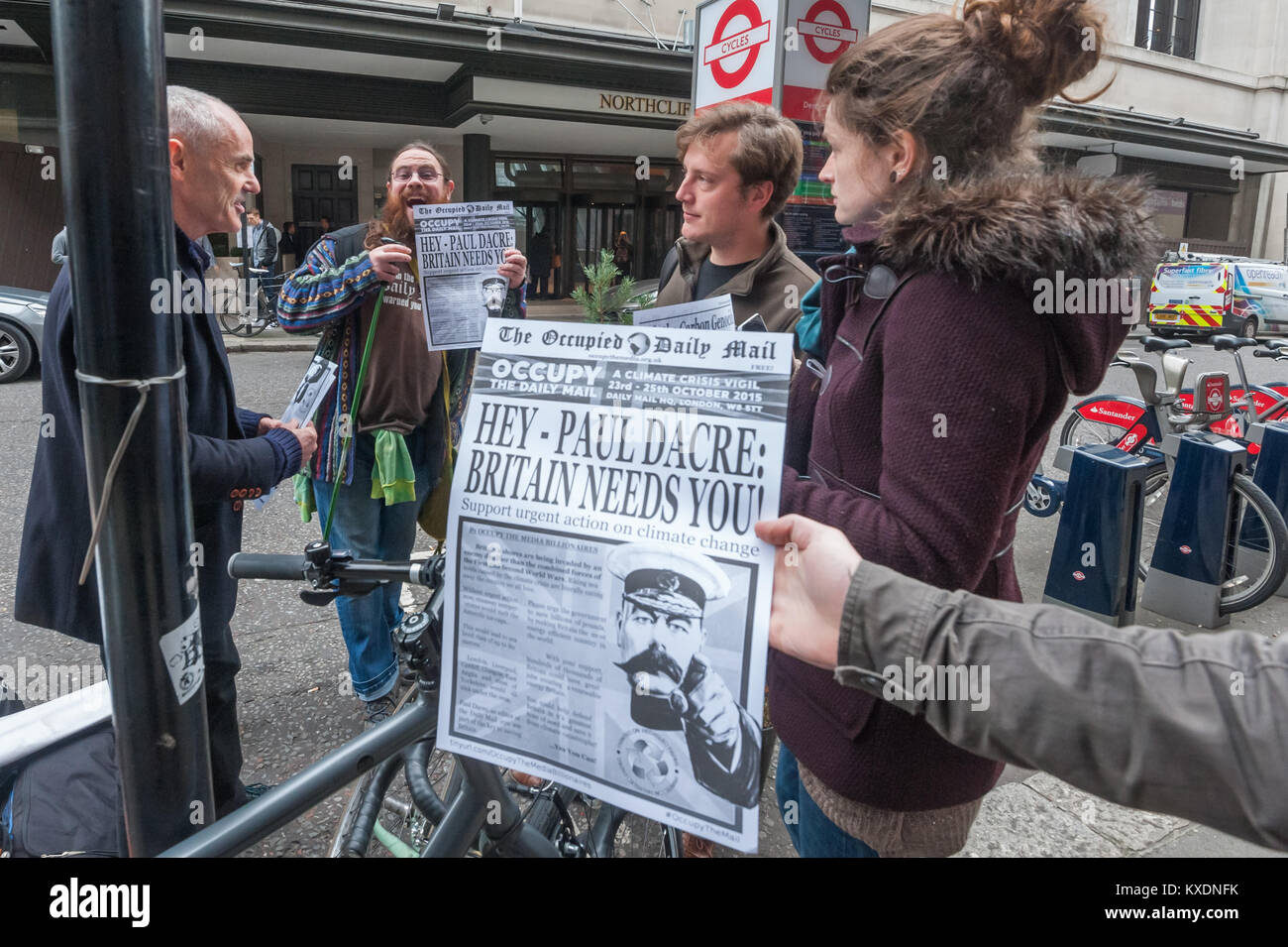 Donnachadh McCarthy and others with copies of 'The Occupied Daily Mail' at  48 hour protest by Occupy to persuade the Daily Mail to end support for fossil fuels and climate deniers and promote policies which mitigate climate change. Stock Photo