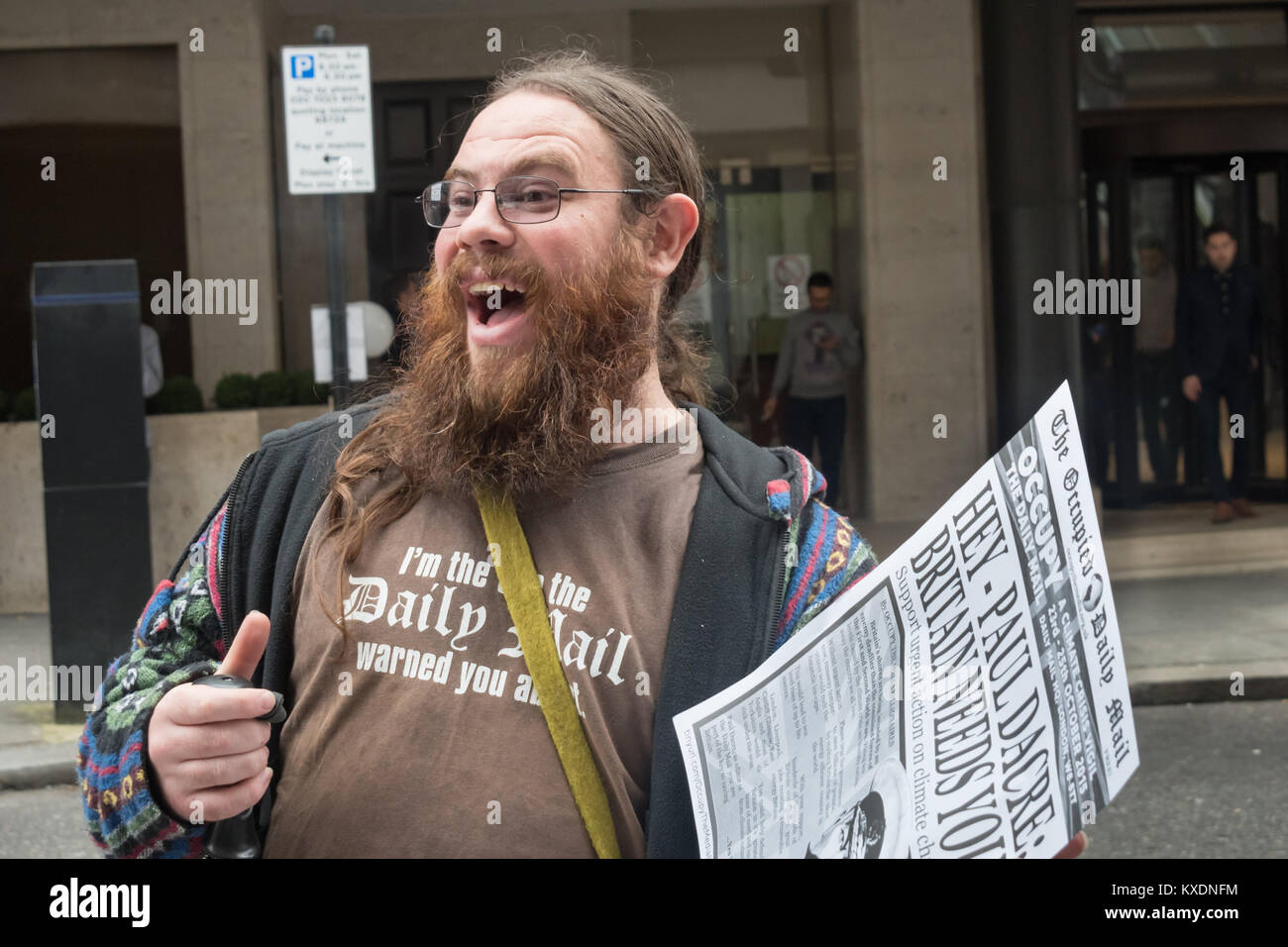'I'm the one the Daily Mail warned you about' stated the t-shirt at the 48 hour protest by Occupy aimed at getting the Daily Mail to end its support for fossil fuels and climate deniers and to support policies which mitigate climate change. Stock Photo