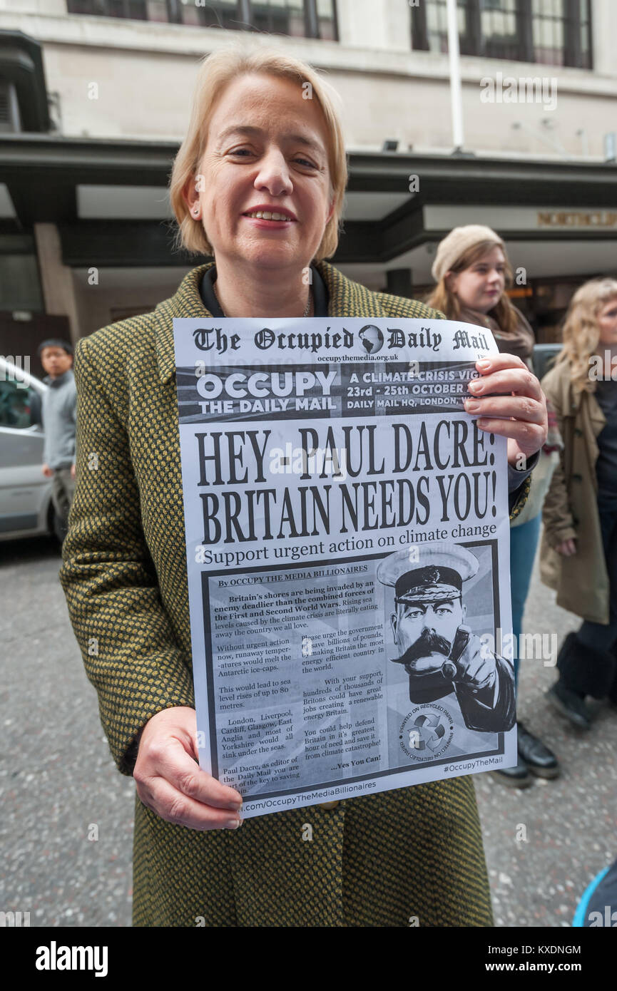 Green Party leader Natalie Bennet holds a copy of The Occupied Daily Mail. After speaking at the protest she was to go with Donnachadh McCarthy to try to persude editor Paul Dacre to support policies which mitigate climate change. Stock Photo