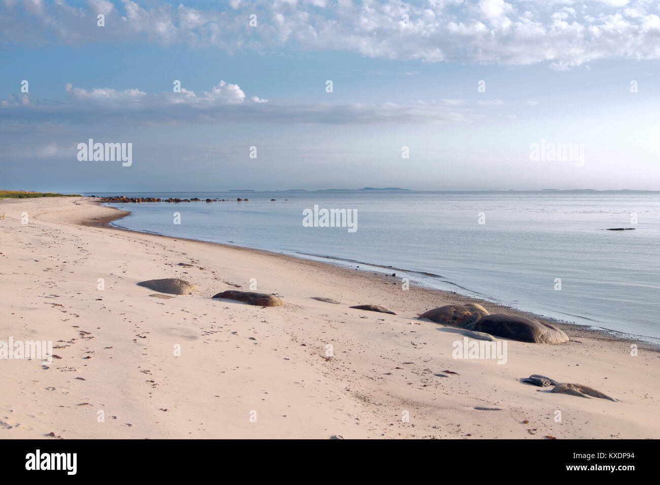 Sea beach with white sand and cloud blue sky. Stock Photo