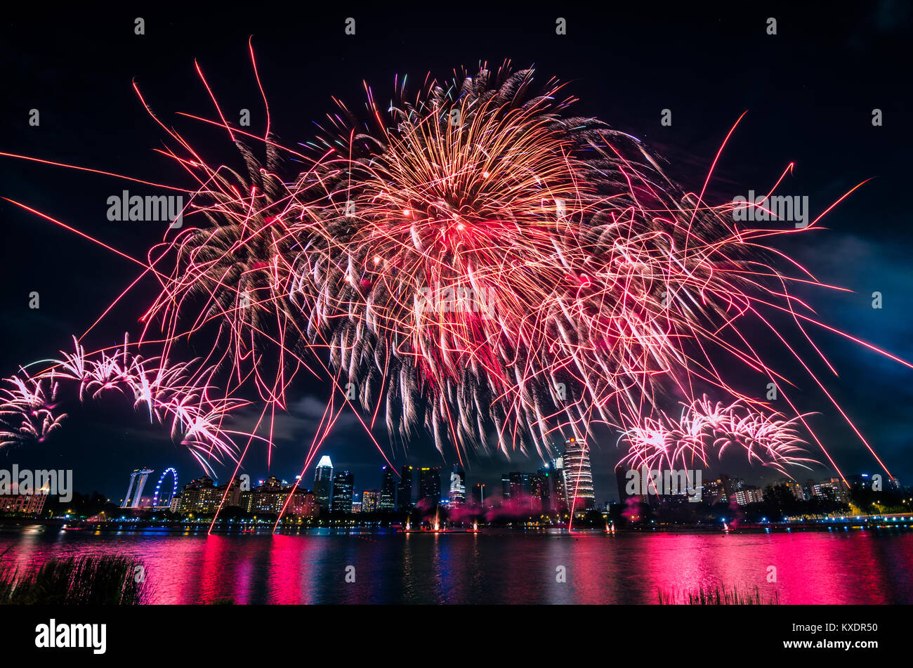 Firework display for Singapore National day which celebrated every year on August 9, in commemoration of the Singapore's independence in 1965. Stock Photo