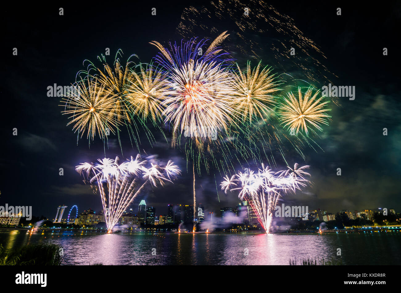 Firework display for Singapore National day which celebrated every year on August 9, in commemoration of the Singapore's independence in 1965. Stock Photo