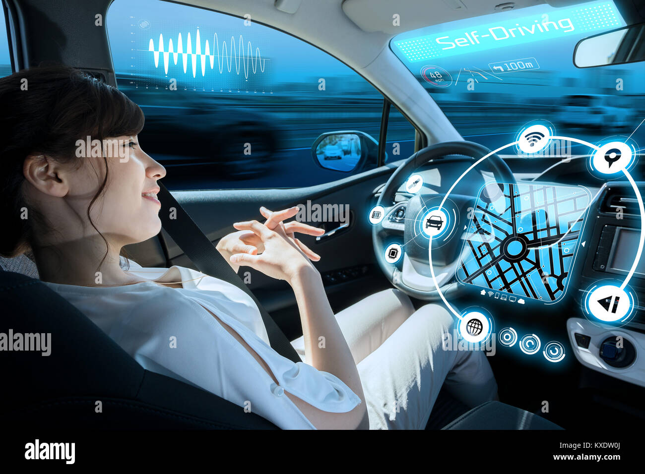 relaxed woman in autonomous car. self driving vehicle. autopilot. automotive technology. Stock Photo
